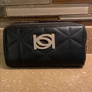 bebe “Zaza” Black Quilted Faux Leather Zip Around Wallet W/Rhinestone Logo